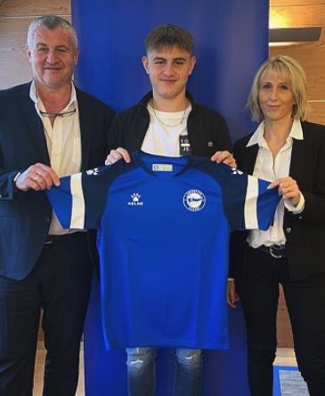 Agnes Fevre and her ex-husband with their youngest son Leo during his first professional contract with Deportiva Alaves